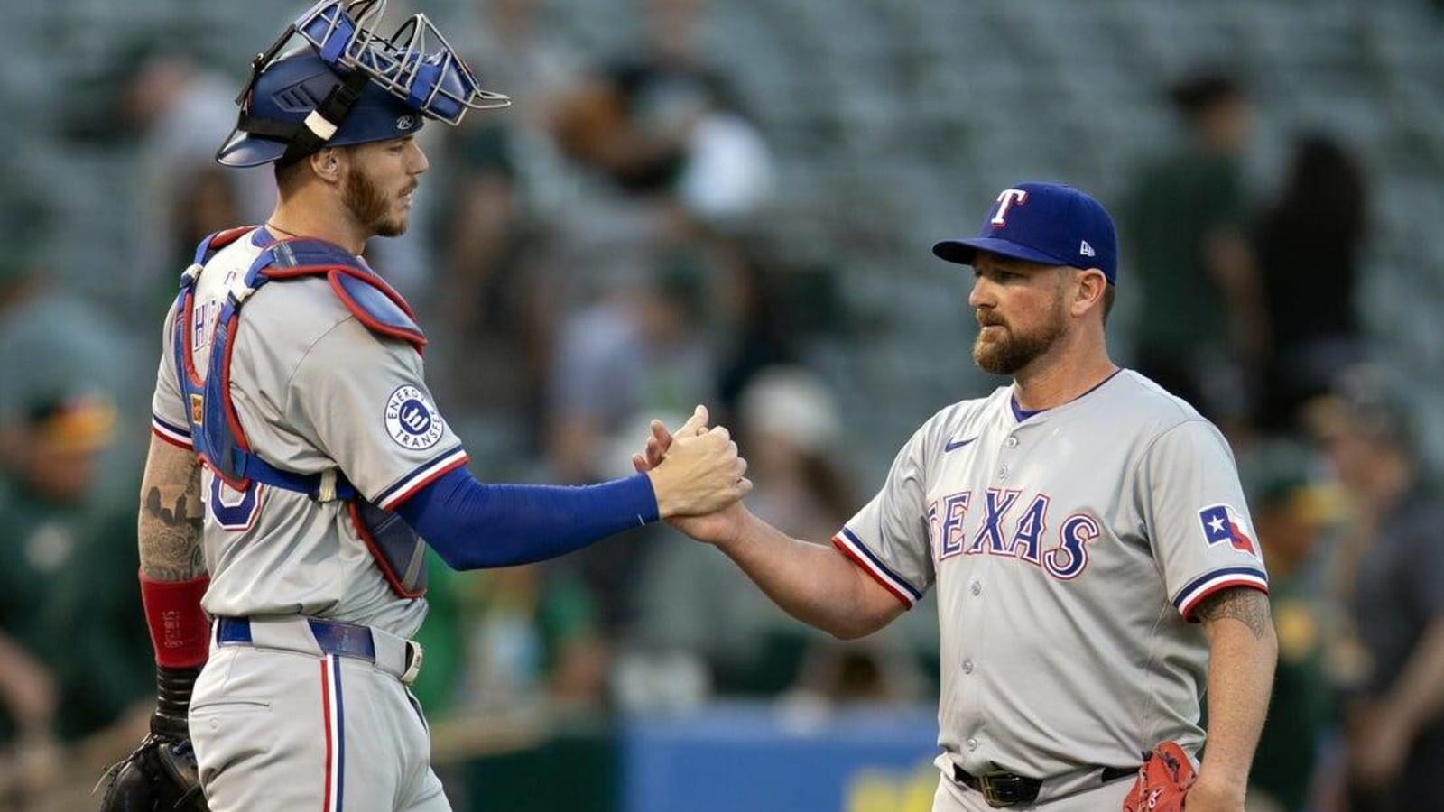 Rangers outslug A&#39;s to earn doubleheader split
