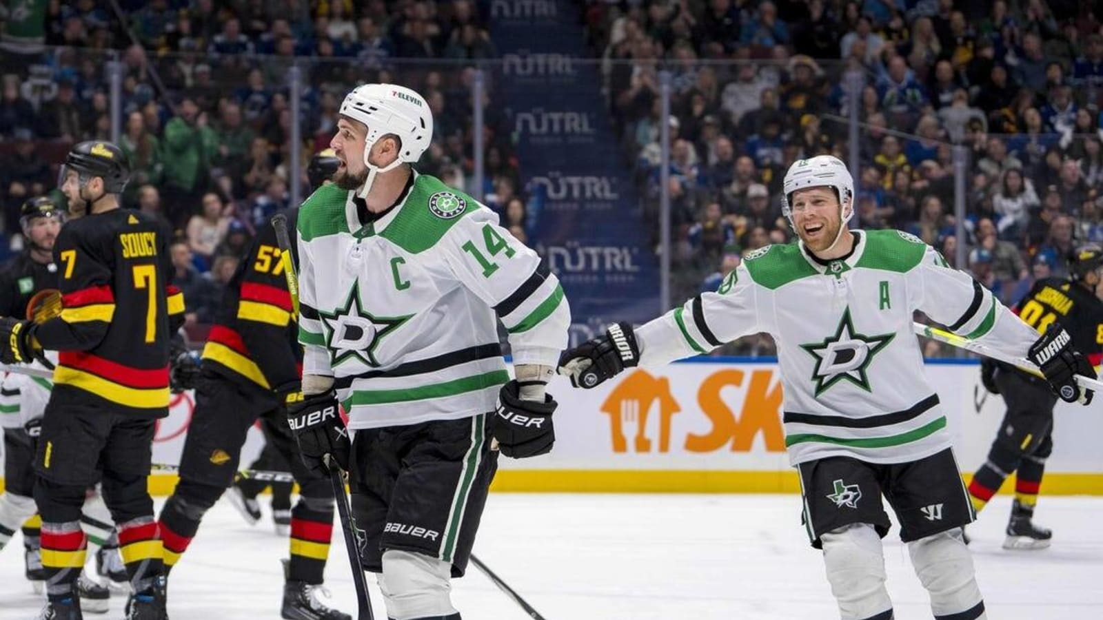 Surging Stars sink Canucks, clinch playoff spot