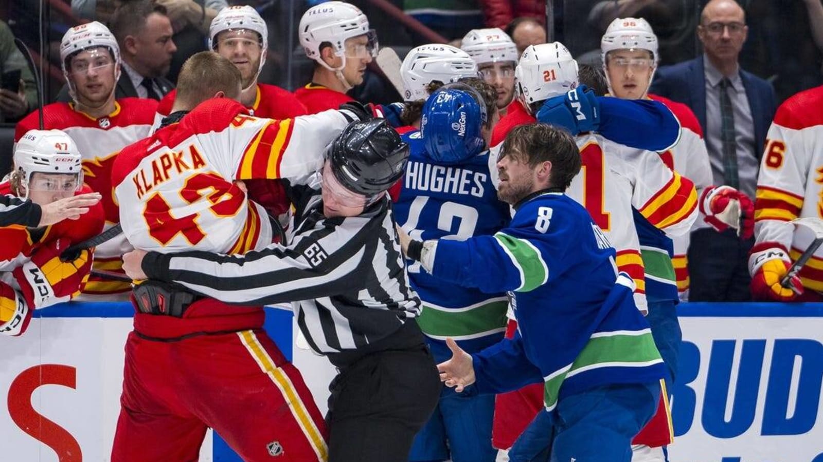 Canucks down Flames to clinch Pacific title