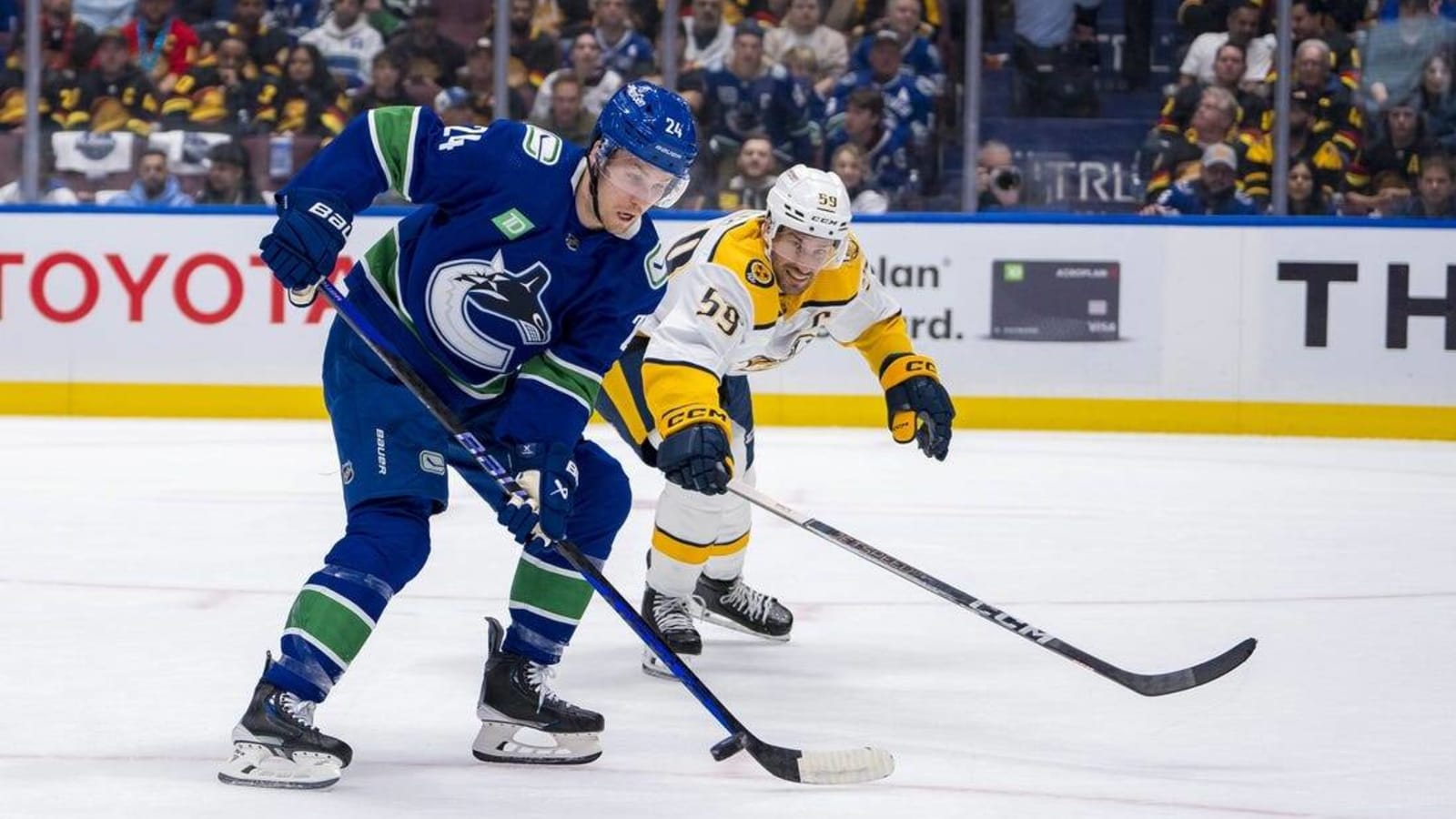 Rapid-fire goals lift Canucks over Predators to open series