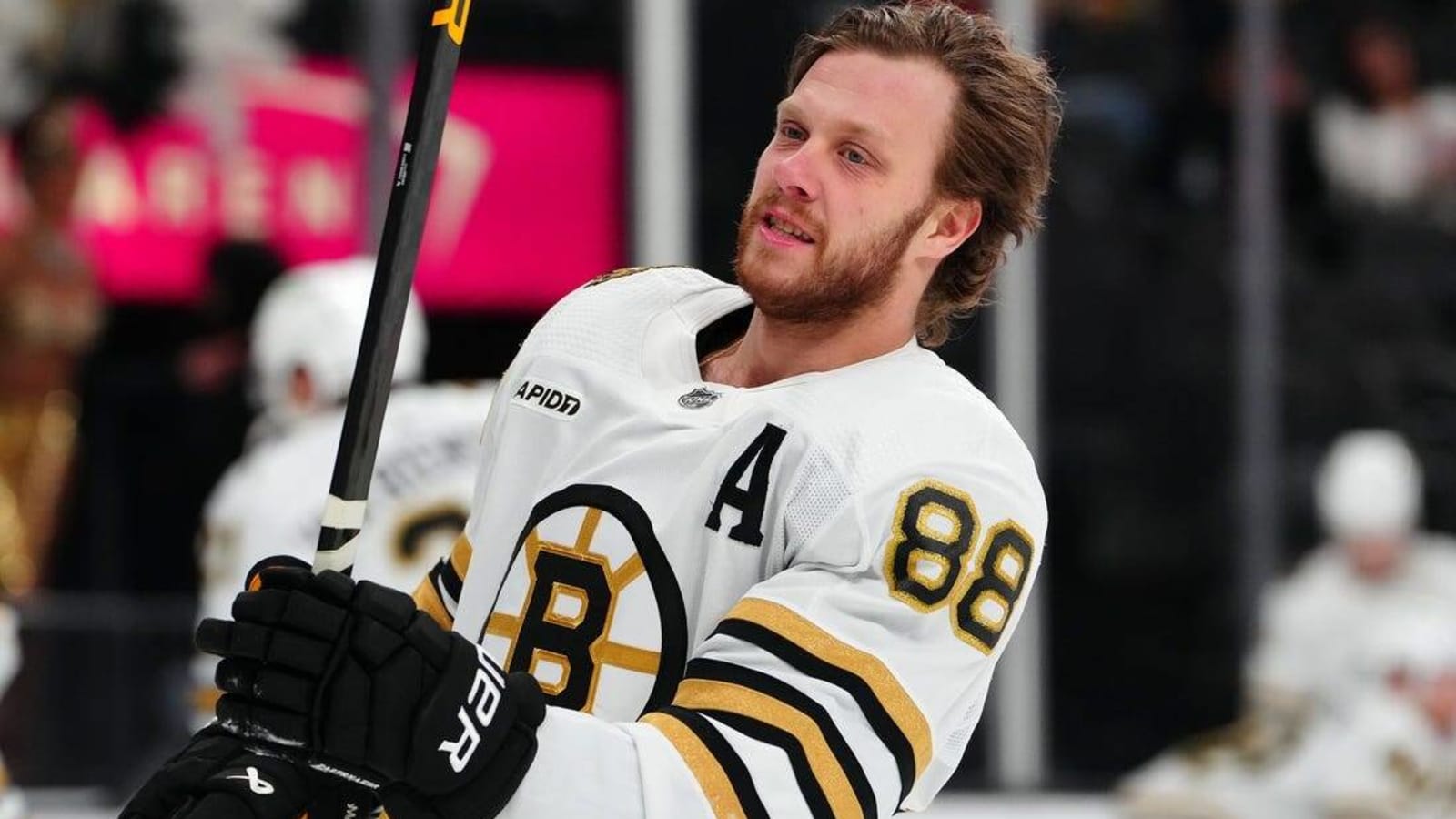 Brad Marchand sends Bruins past Senators in OT