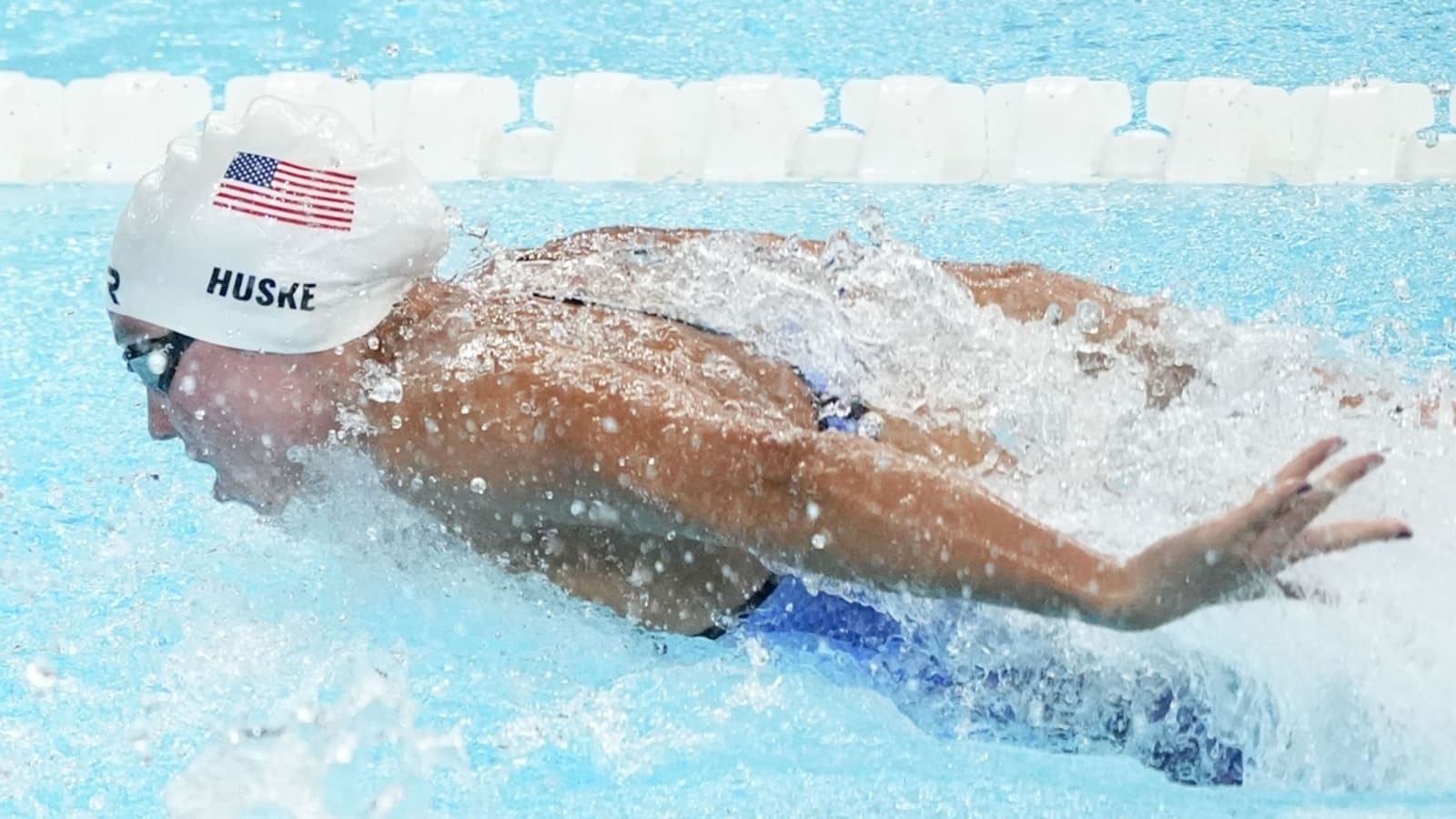 Leon Marchand energizes France in pool; Torri Huske wins gold for U.S.