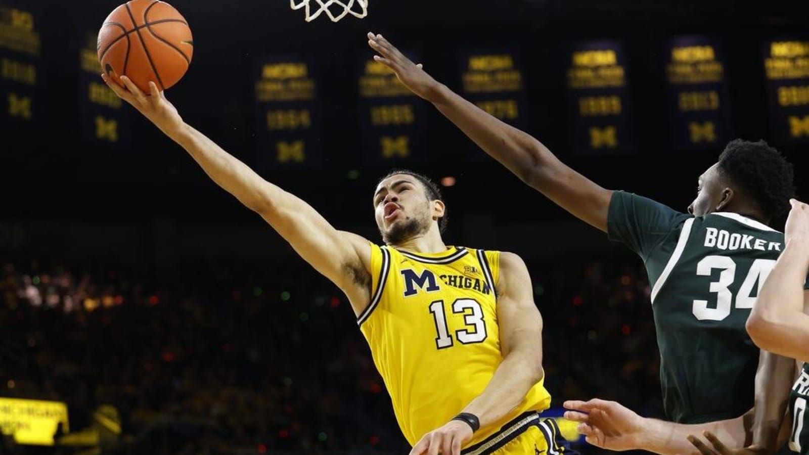 Season, collegiate career over for Michigan F Olivier Nkamhoua (wrist)