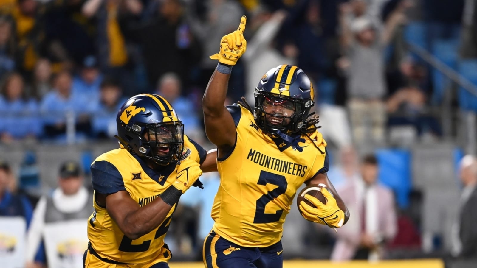 West Virginia DB Aubrey Burks taken from field on stretcher