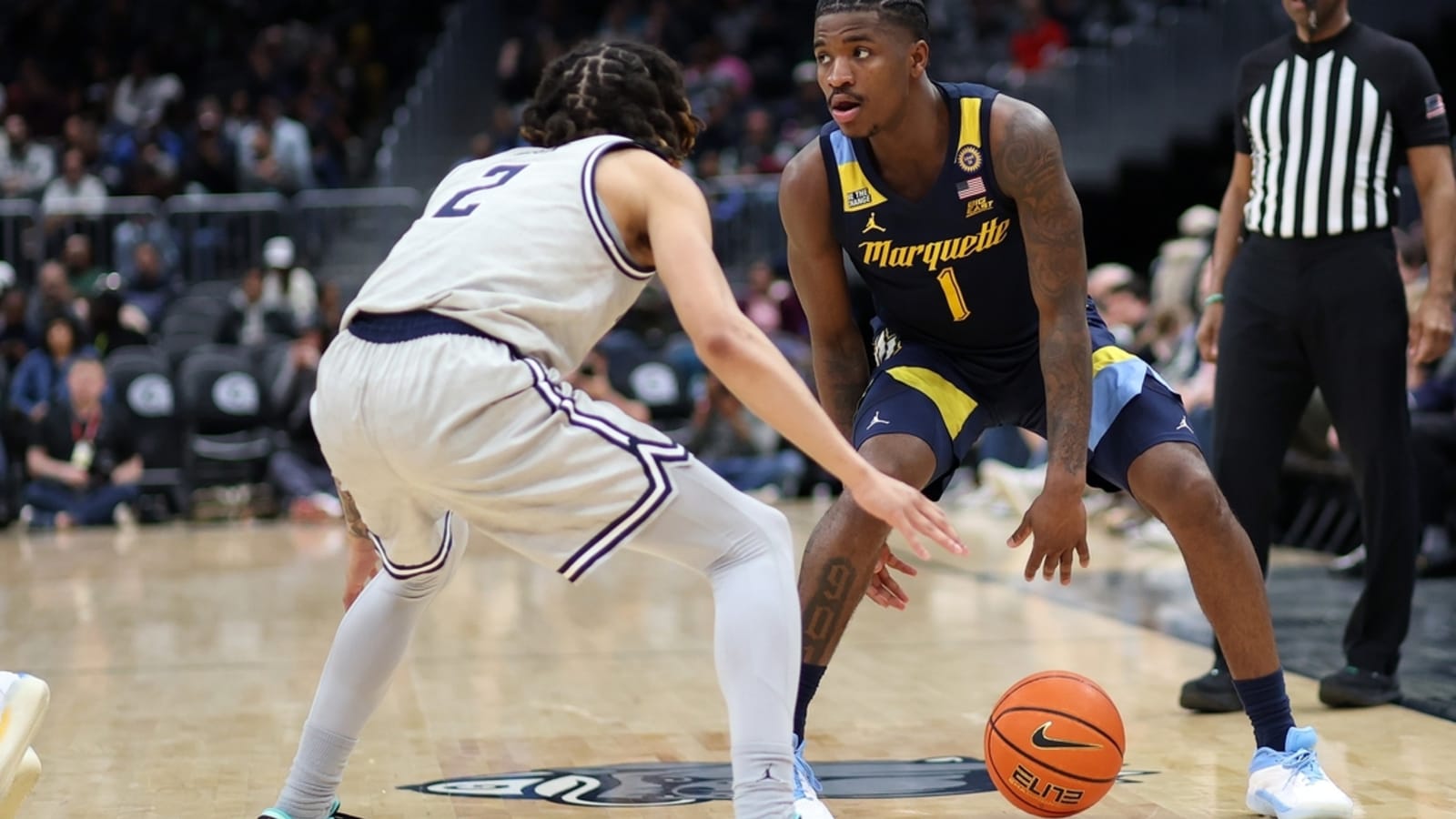 No. 21 Marquette notches road win in overwhelming Georgetown