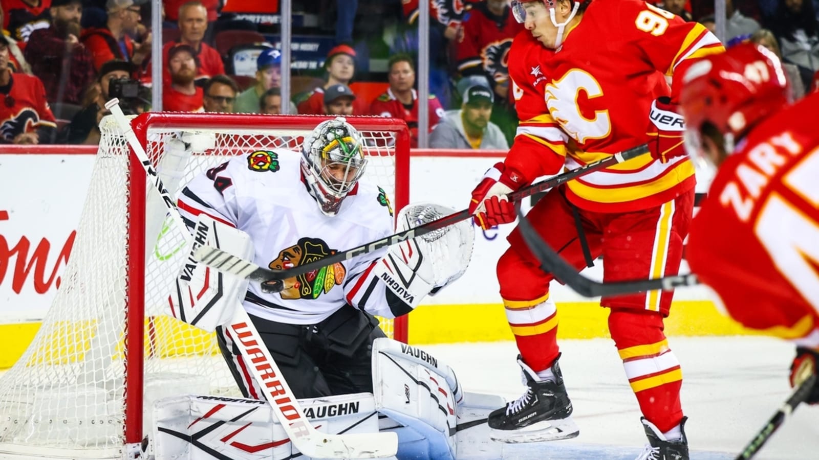 Flames best Blackhawks, match franchise mark at 4-0-0