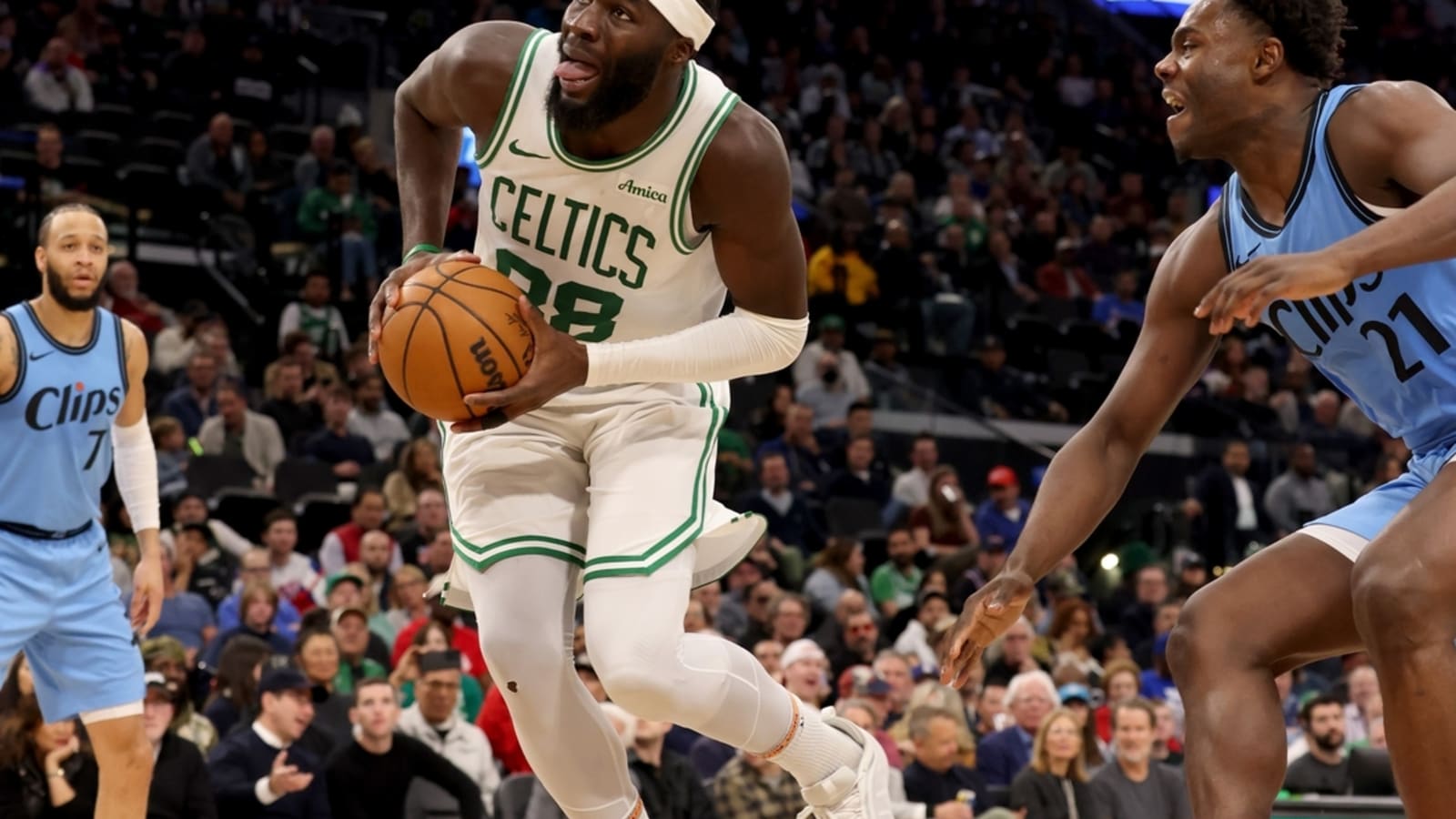 Celtics need overtime to slip past Clippers