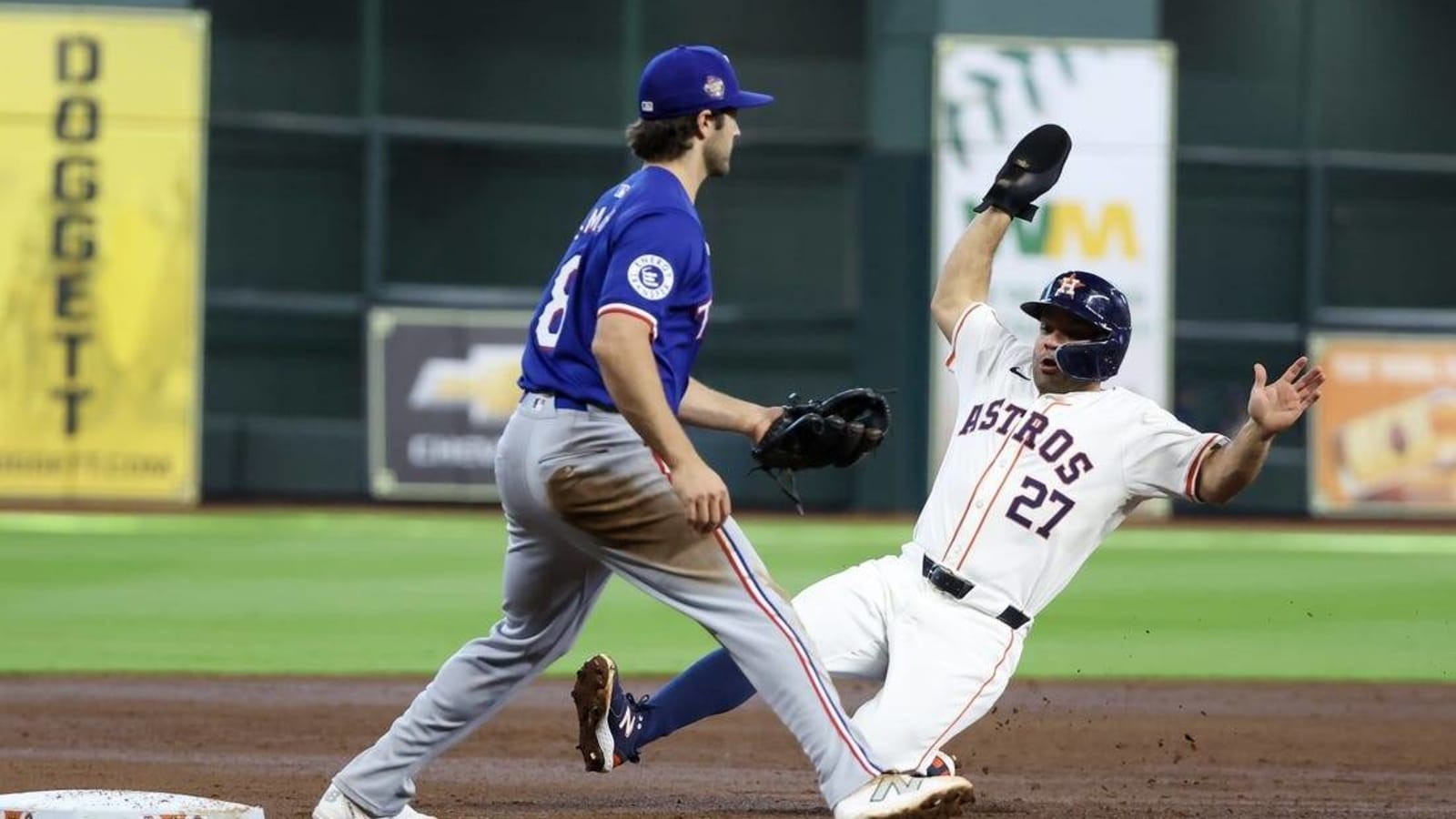 Astros push past Rangers on seven-run inning