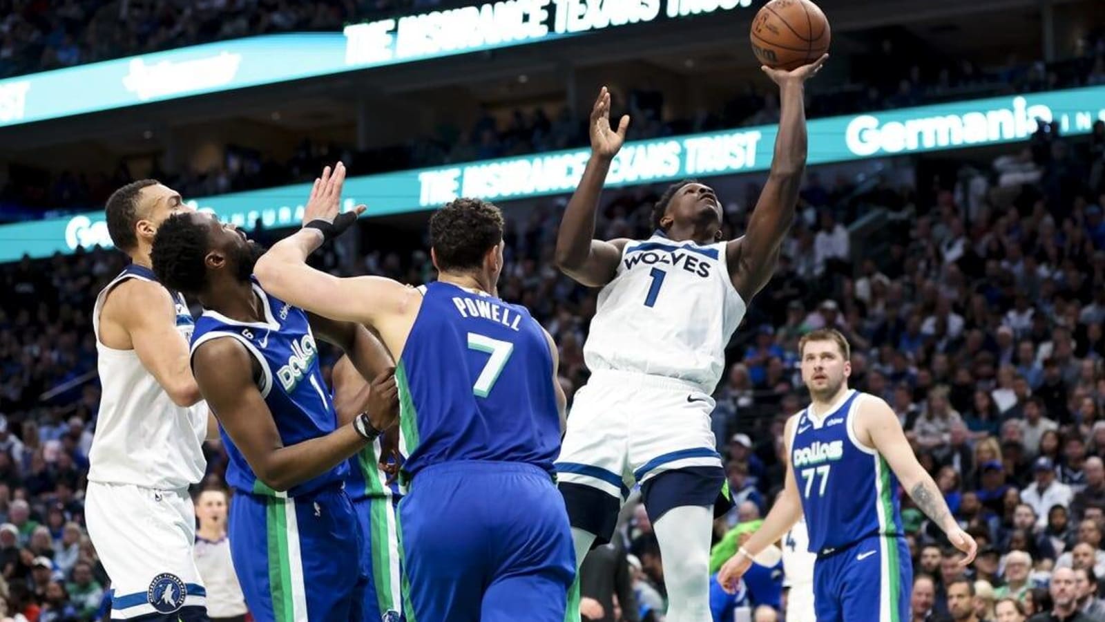 Wolves withstand furious charge from Kyrie Irving, Mavs