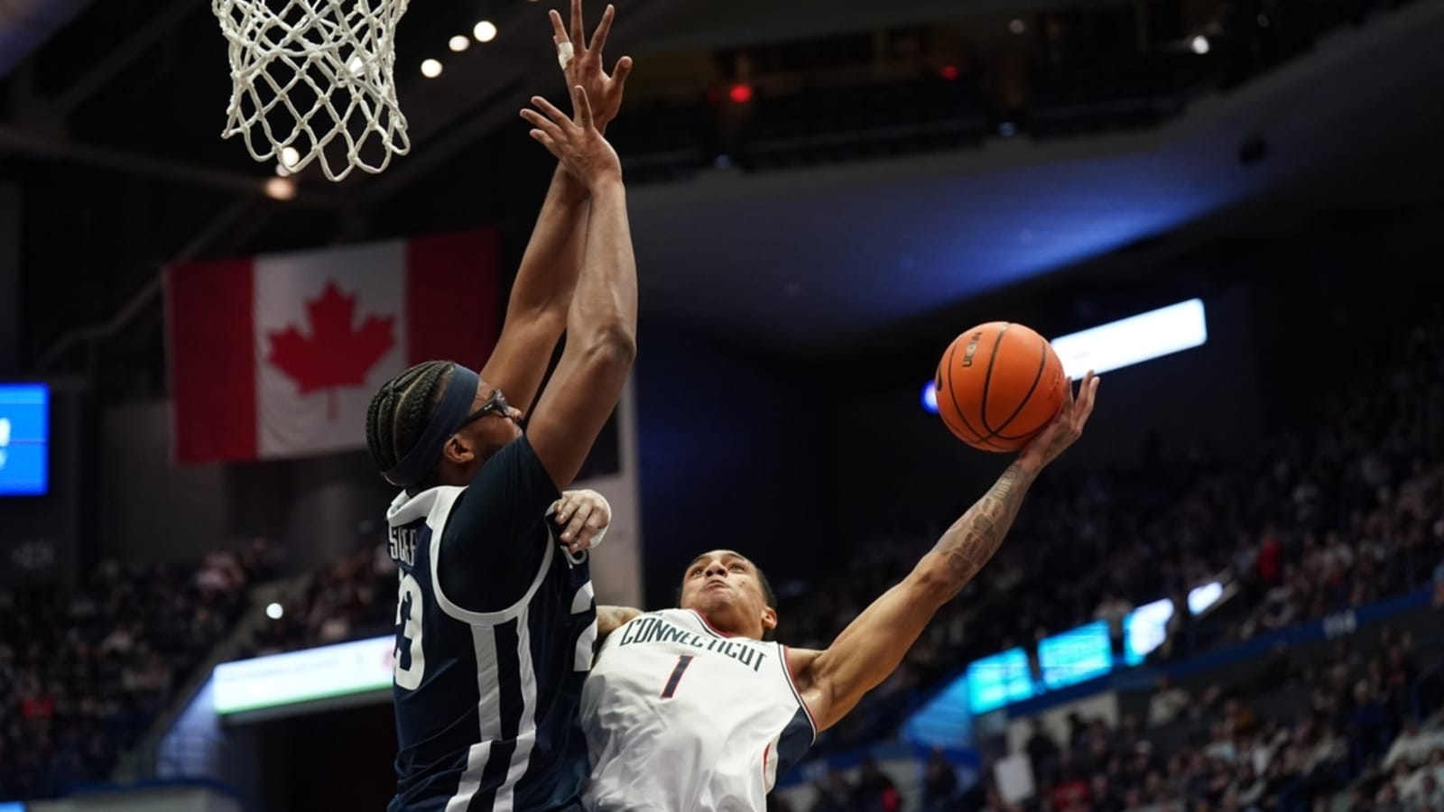 No. 19 UConn escapes pesky Butler in overtime