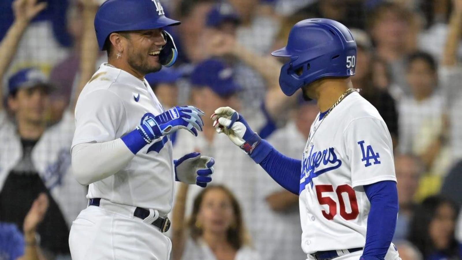 Dodgers get rare Miguel Rojas homer, thump A&#39;s again