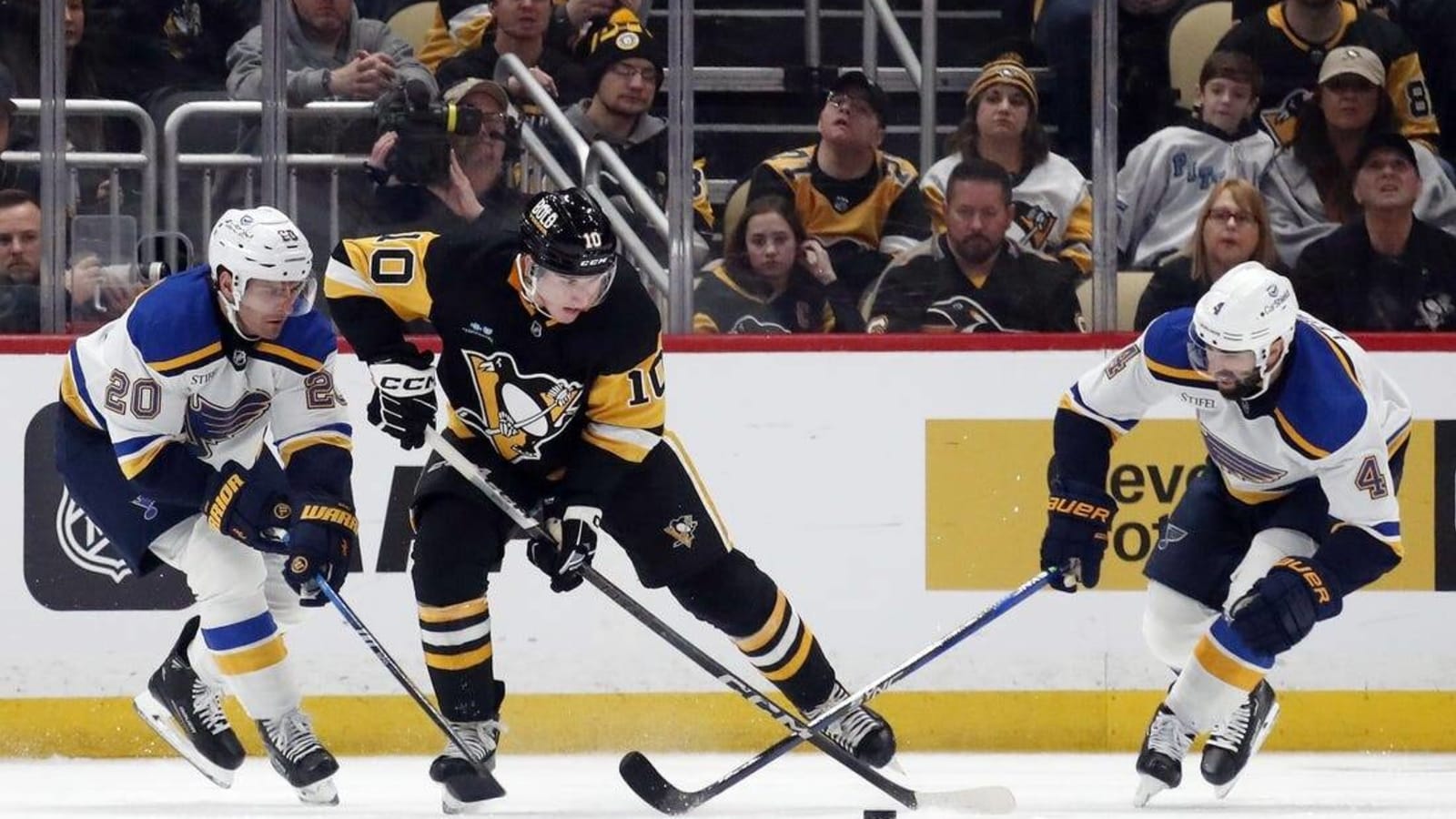 Hot Penguins slide past Blues