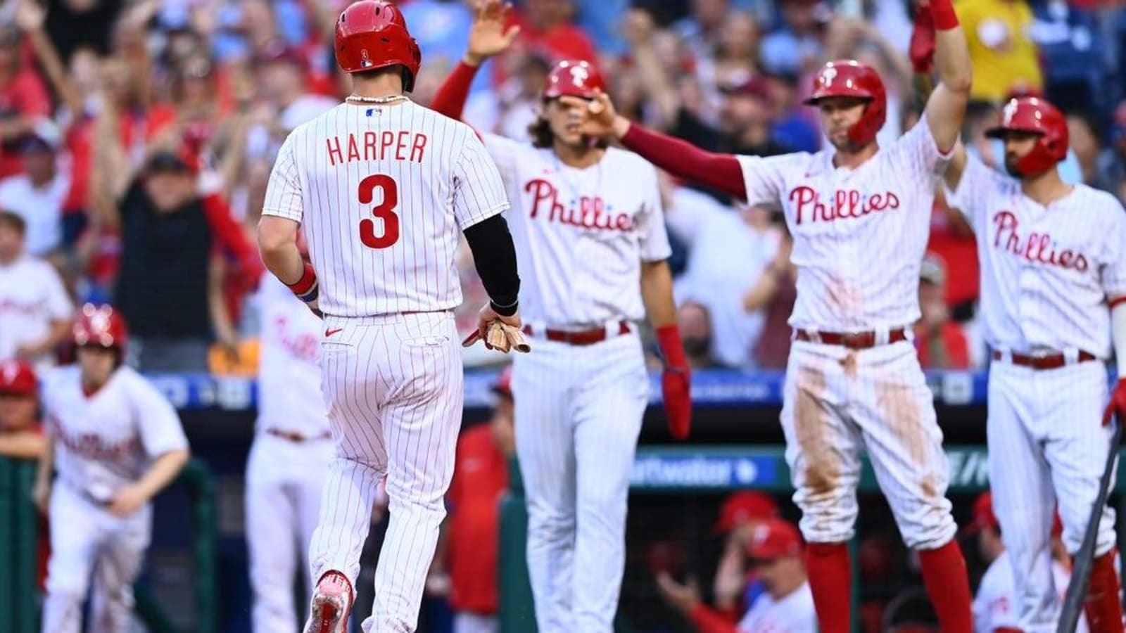 Phillies claw back from five down to best Pirates