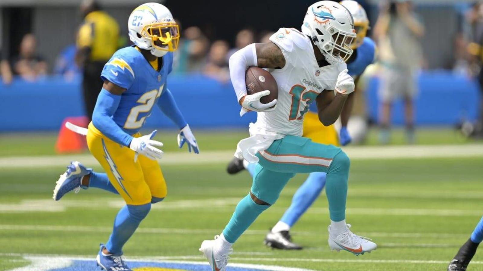 Dolphins outlast Chargers 36-34 in wild opener