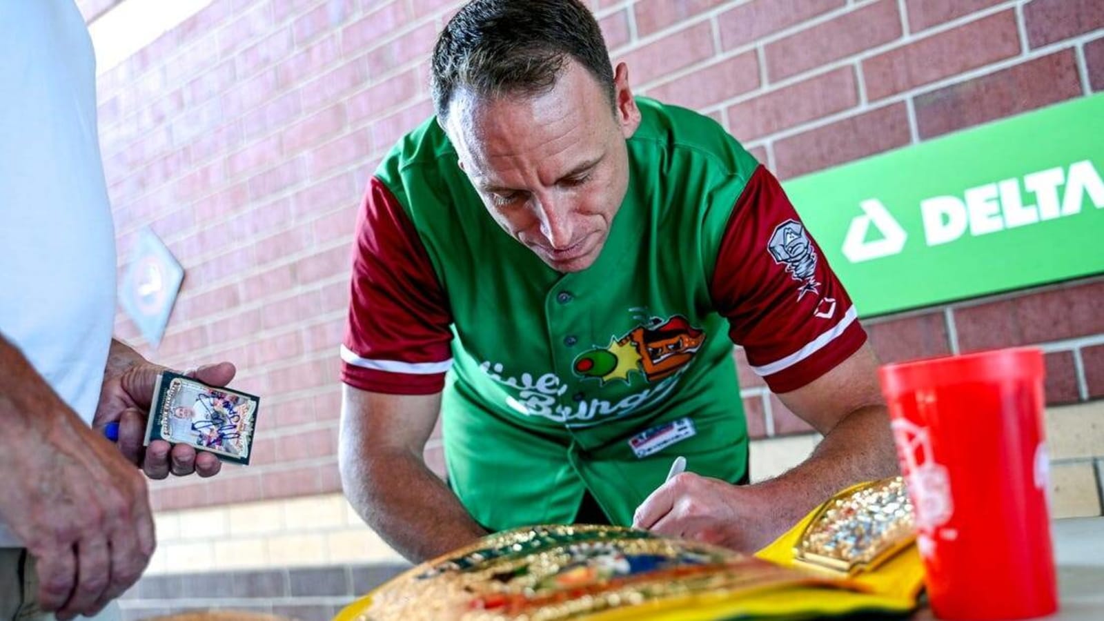 Joey Chestnut banned from hot dog eating contest over sponsor conflict