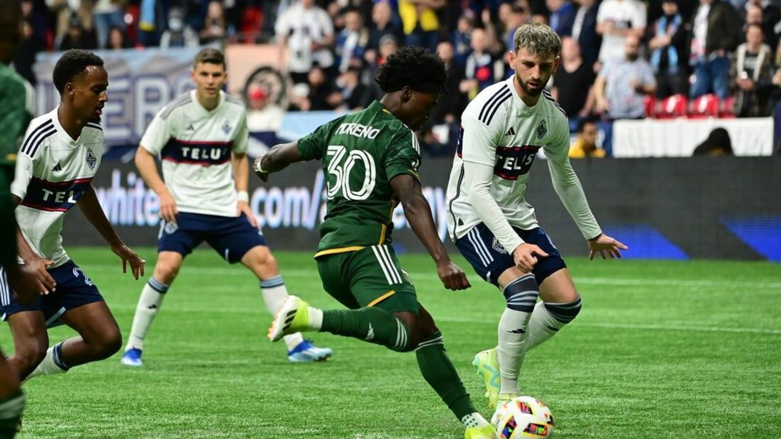 Ryan Raposo&#39;s late goal lifts Whitecaps over Timbers