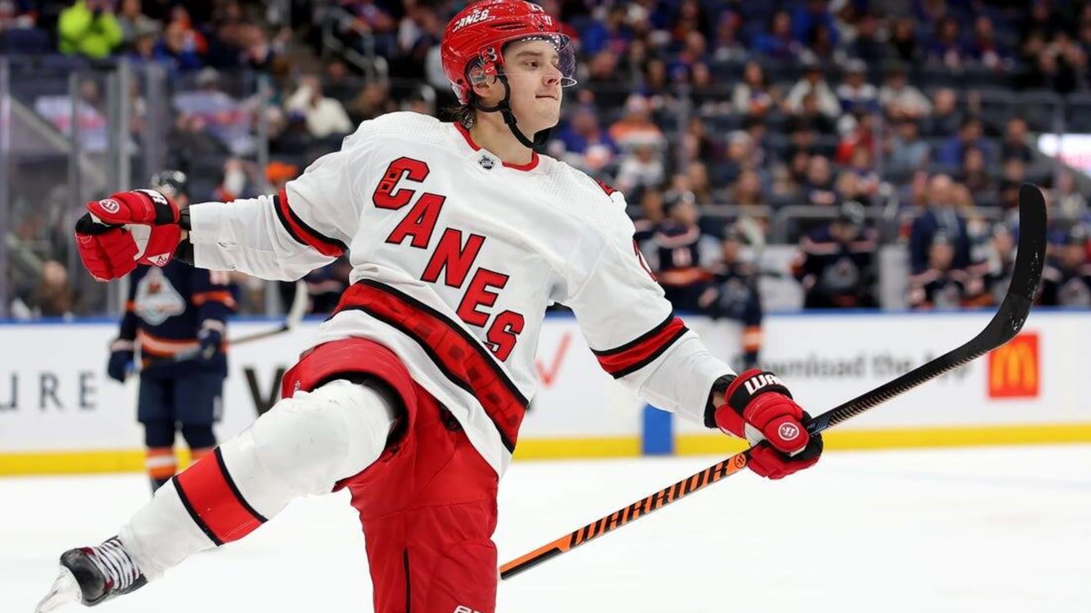 Canes' Aho, Oilers' Hyman each take a puck off the face