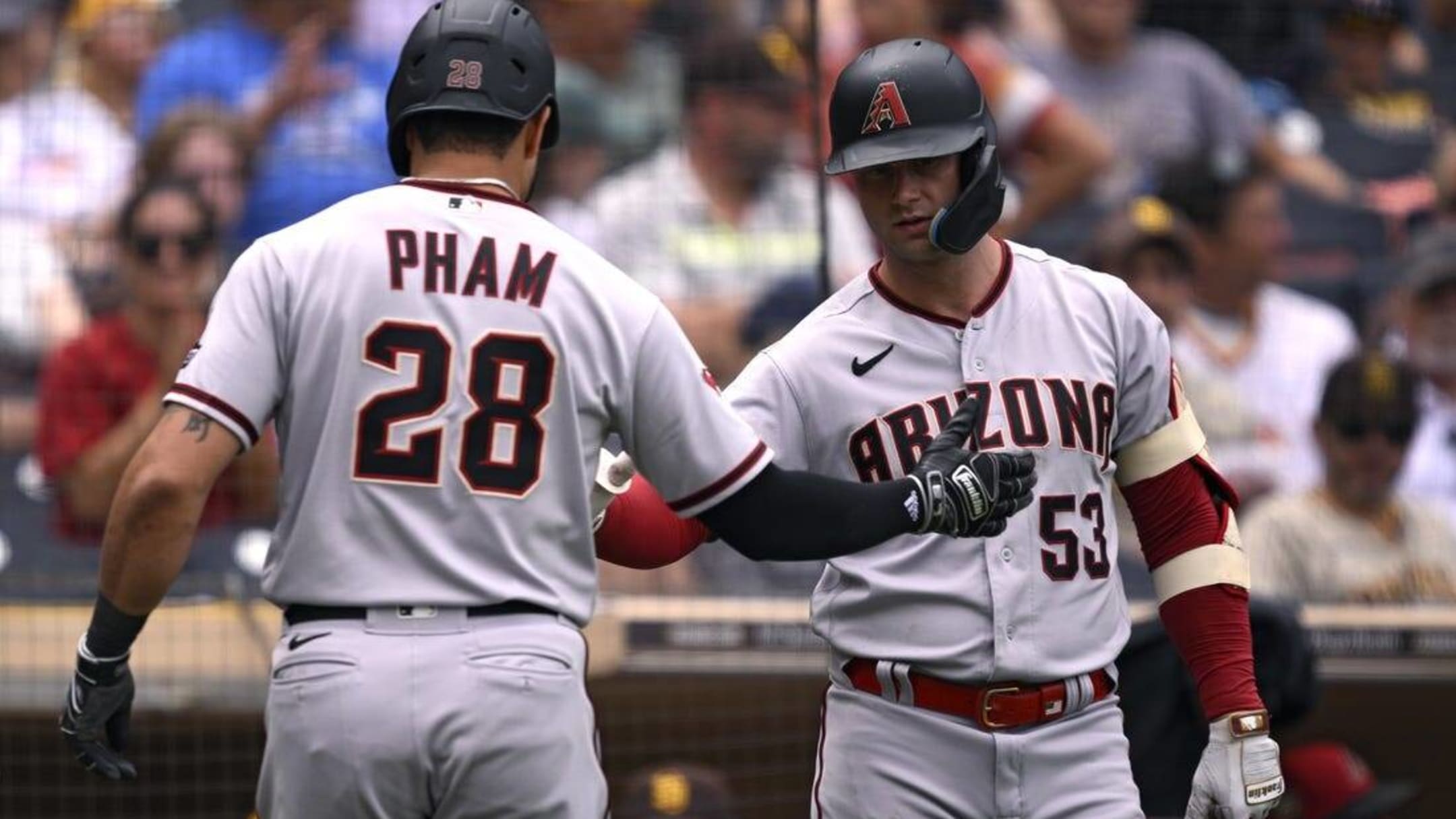 Matt Carpenter of the San Diego Padres hits two-RBI double against the  Arizona Diamondbacks during