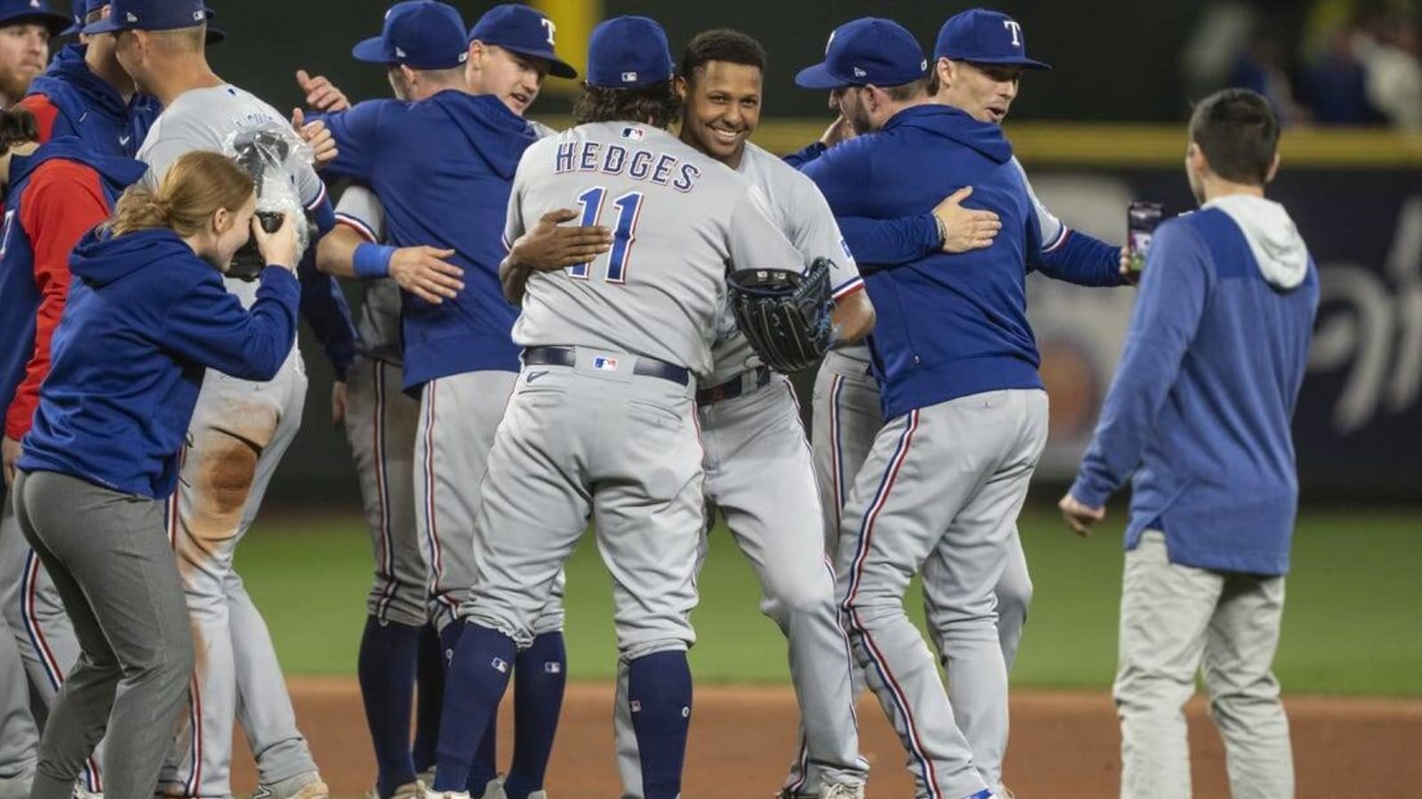 Rangers celebrate; Mariners mourn what could have been