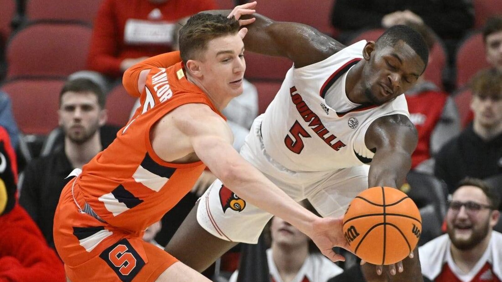 Syracuse holds on for tight win over Louisville