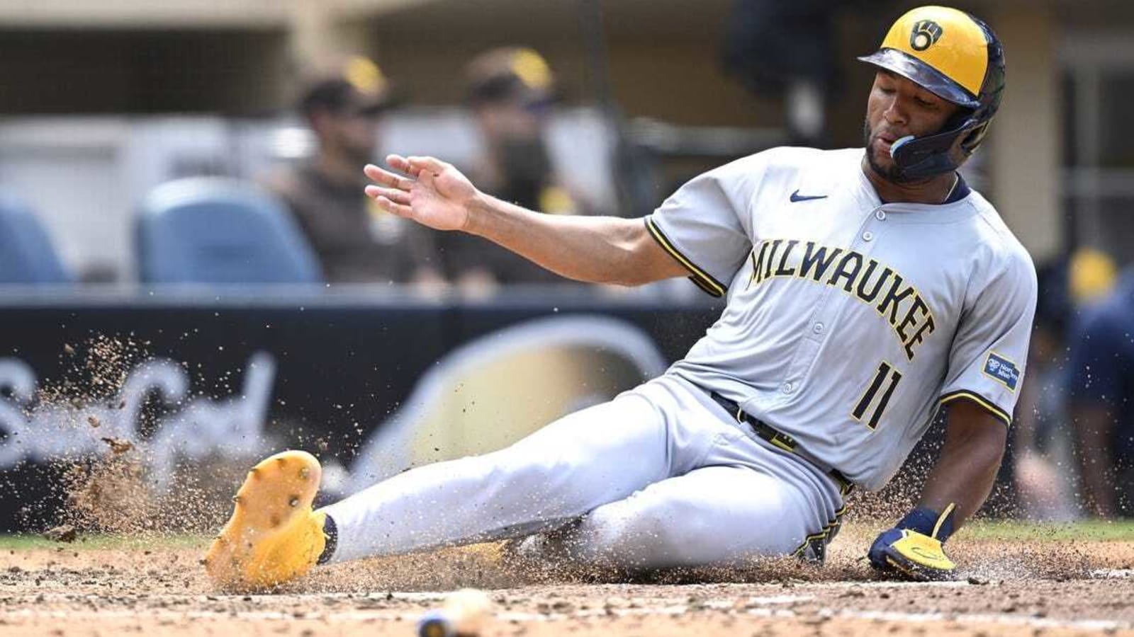 Big inning lifts Brewers over Padres to avoid sweep
