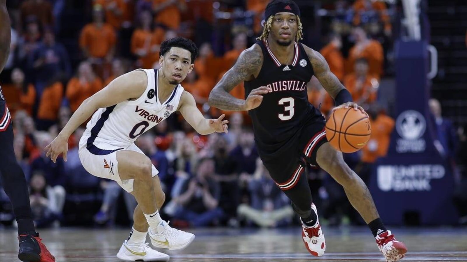 No. 13 Virginia handles Louisville, clinches share of league title