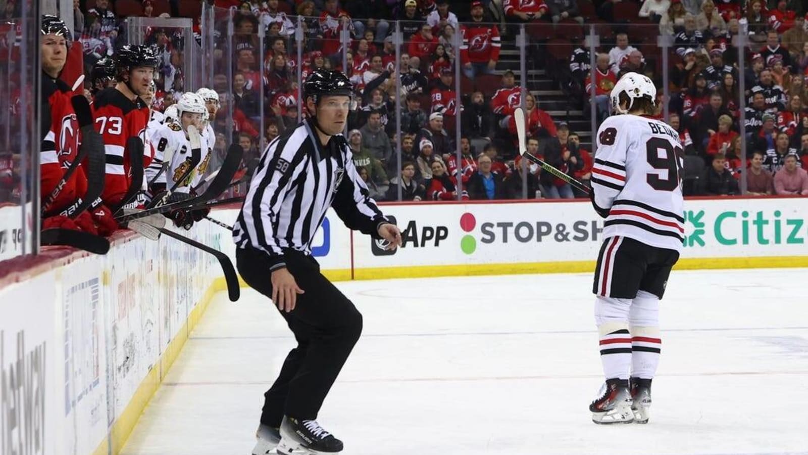 Battered Blackhawks look to cool off Flames