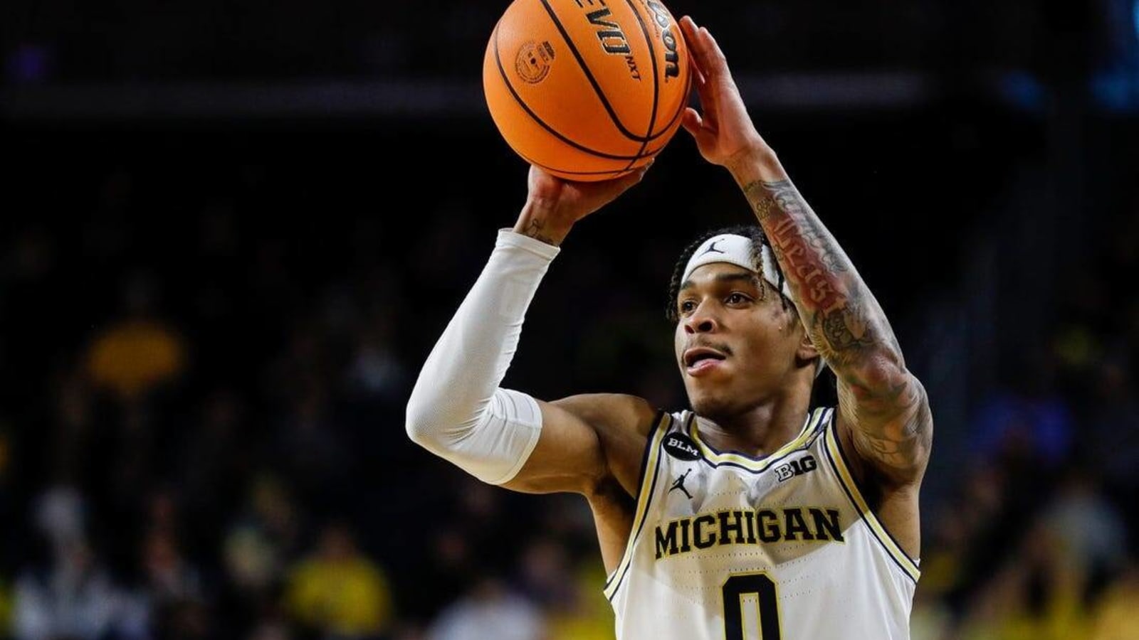 Olivier Nkamhoua&#39;s 25 points helped Michigan defeat UNC Asheville