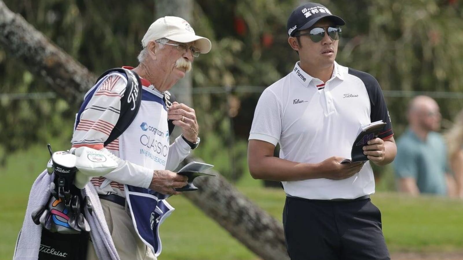 Four caddies -- including one fan -- aid C.T. Pan on Sunday