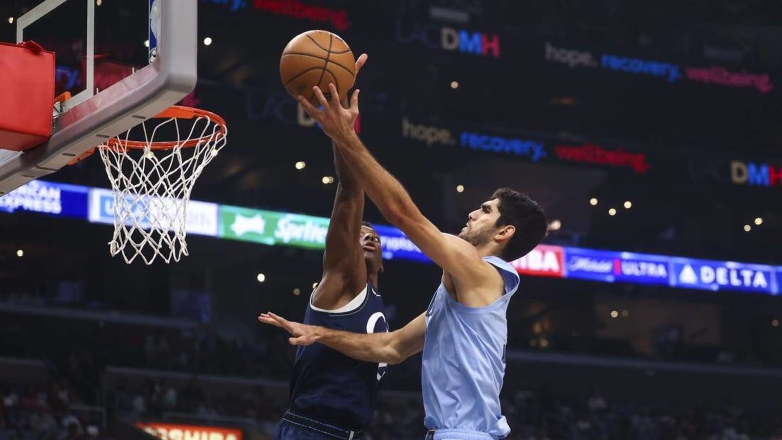 Grizzlies fight off skidding Clippers for second win of season