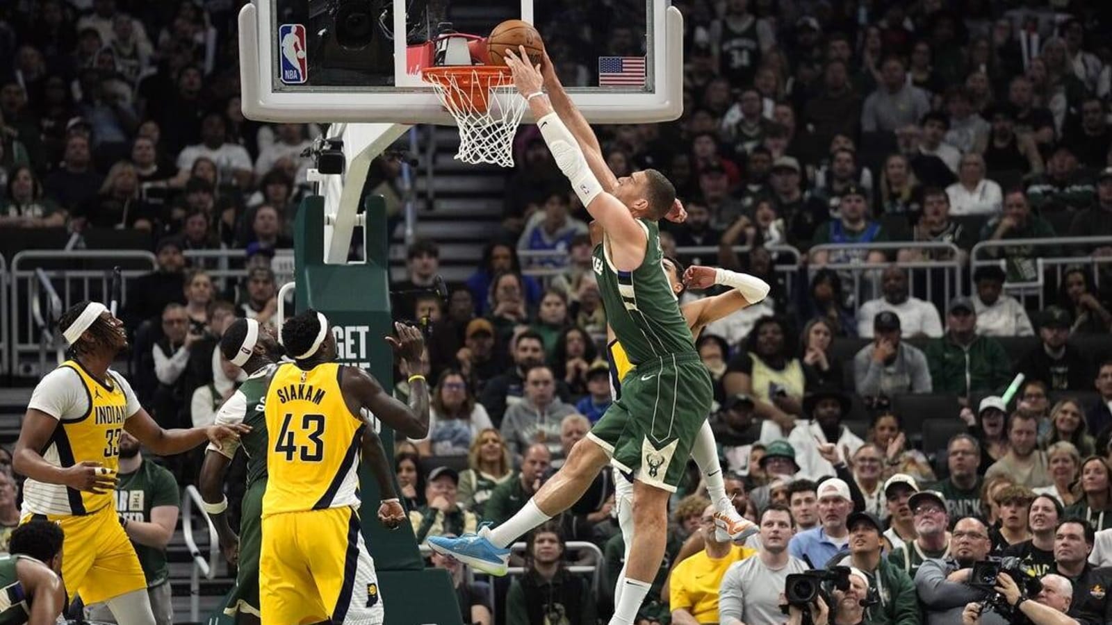 Despite missing stars, Bucks rout Pacers to stay alive