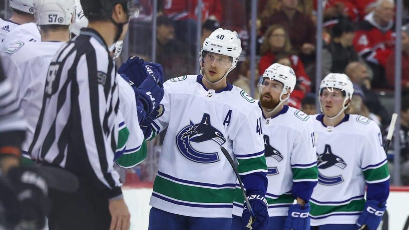 Canucks hold off Devils&#39; comeback bids