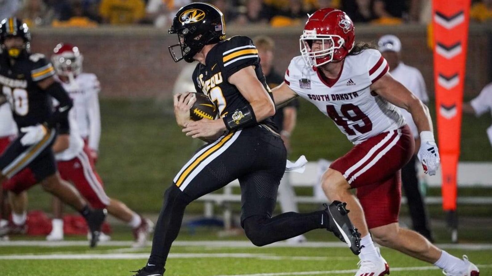 Brady Cook accounts for two TDs to fuel Missouri past South Dakota