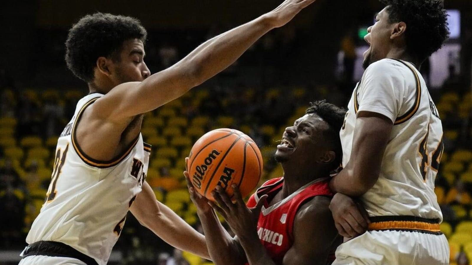 No. 22 New Mexico edges Wyoming on the road