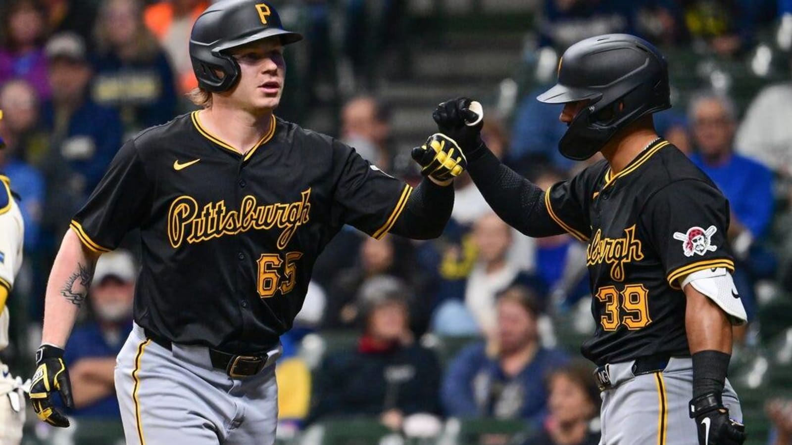 Pirates build big lead, then fend off Brewers