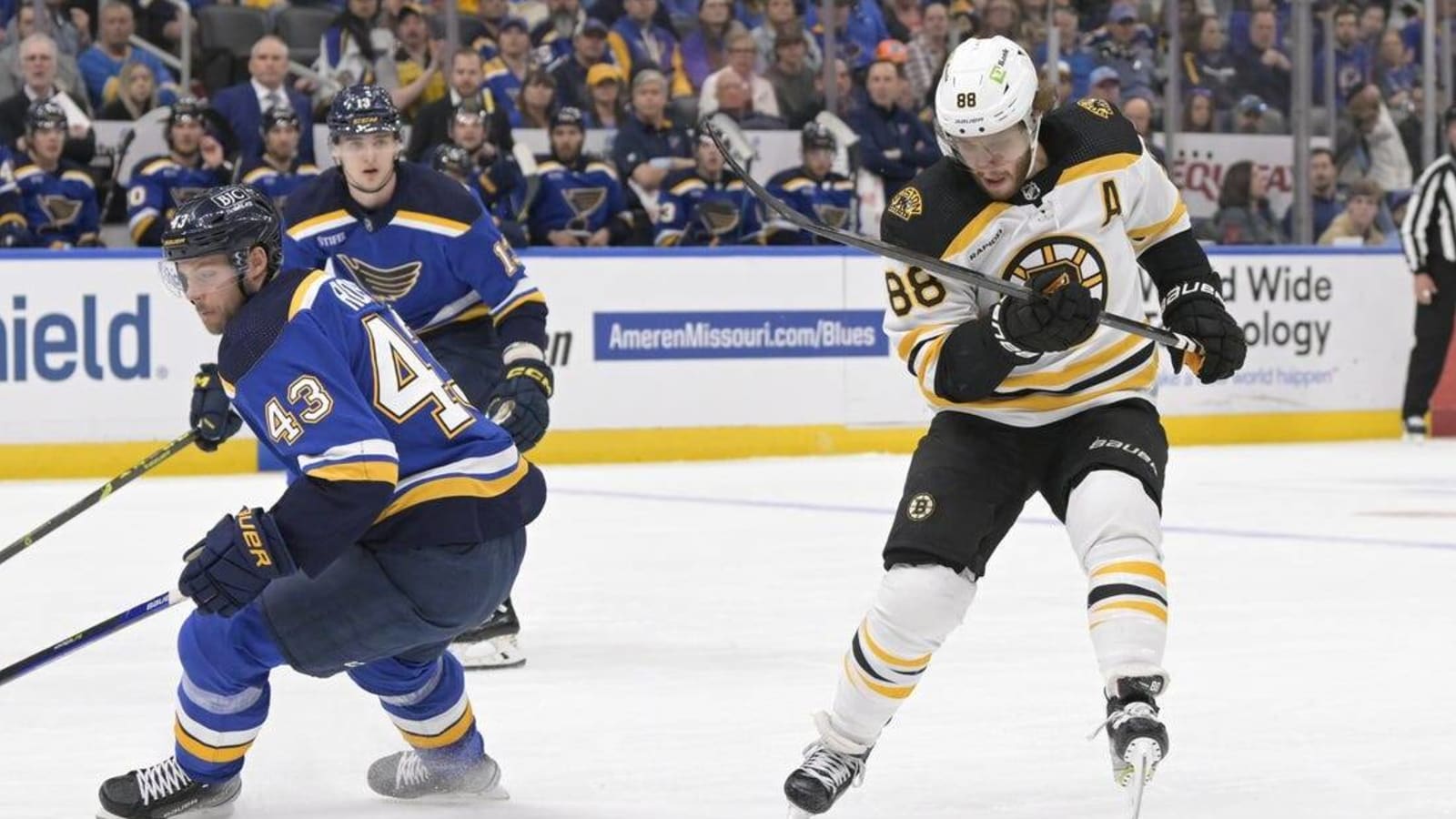 Bruins beat Blues in shootout, become fourth to 60 wins all-time