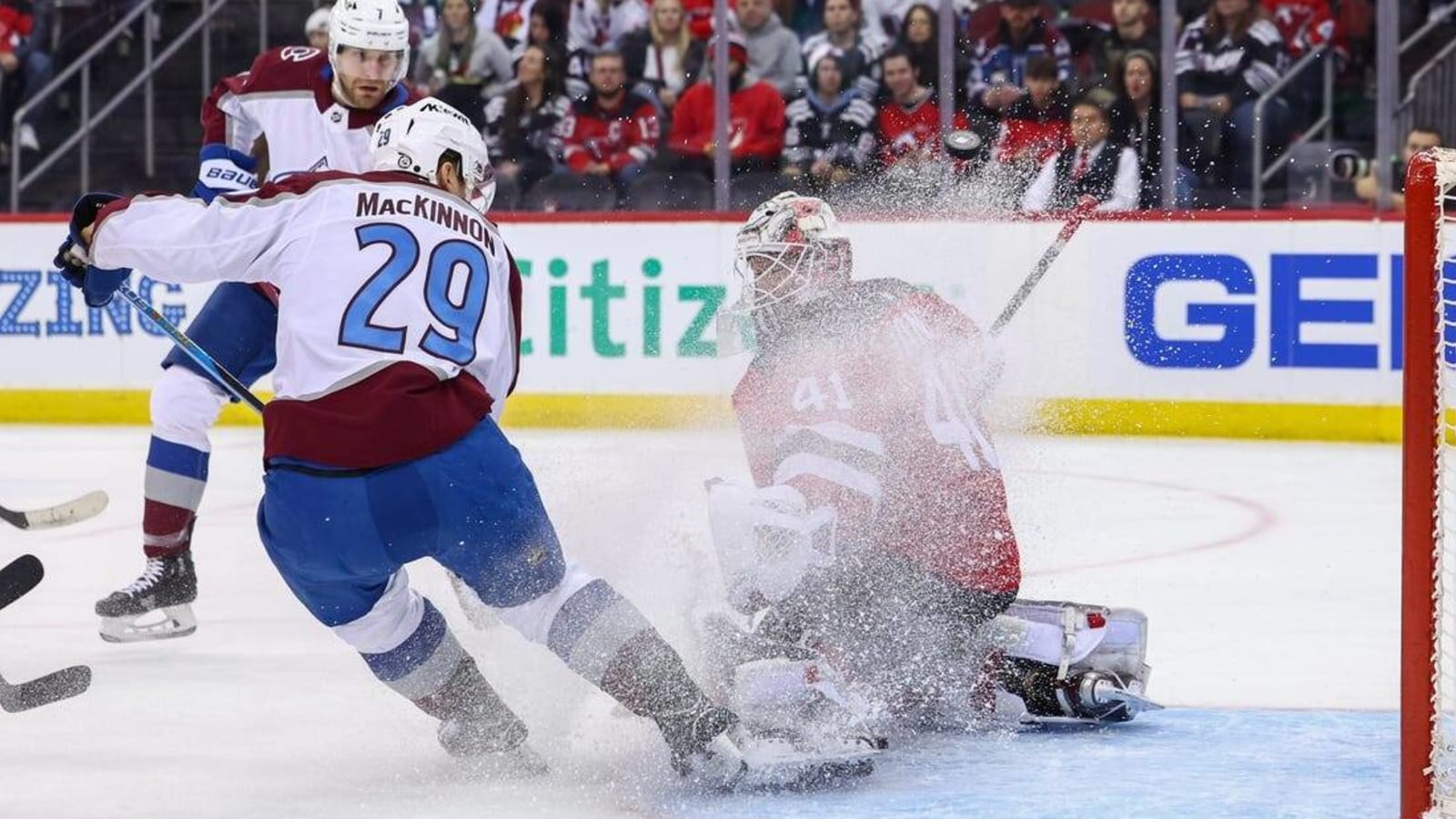 Late surge pushes Devils past Avalanche