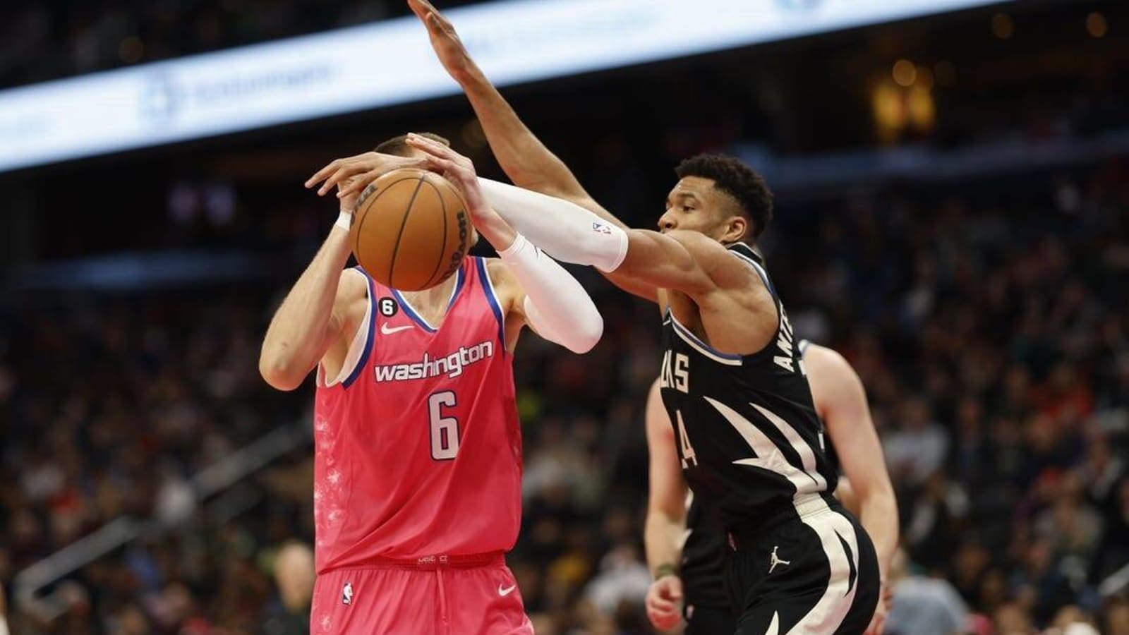 Giannis Antetokounmpo&#39;s triple-double lifts Bucks past Wizards