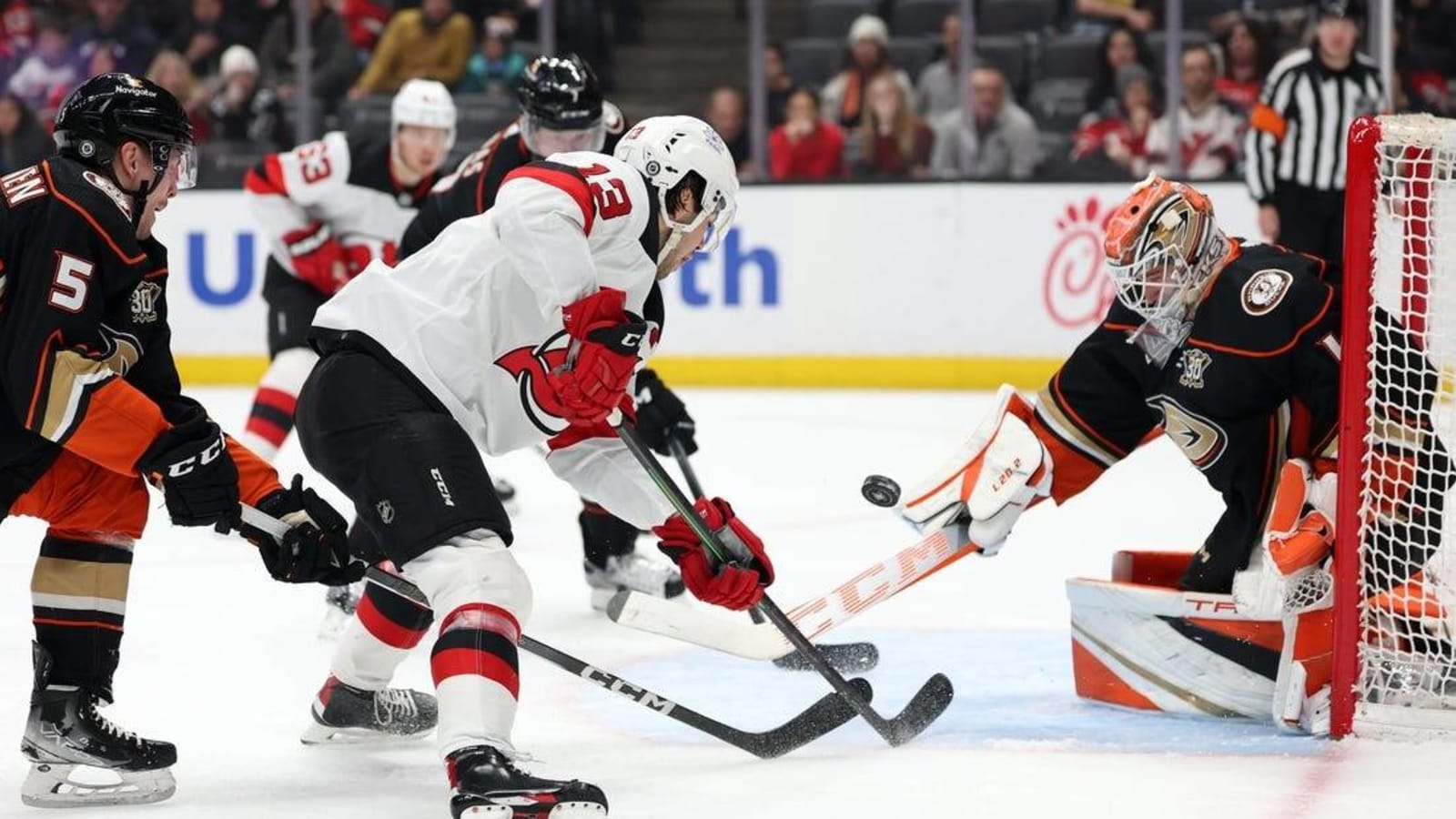 Lukas Dostal makes 52 saves as Ducks hold off Devils