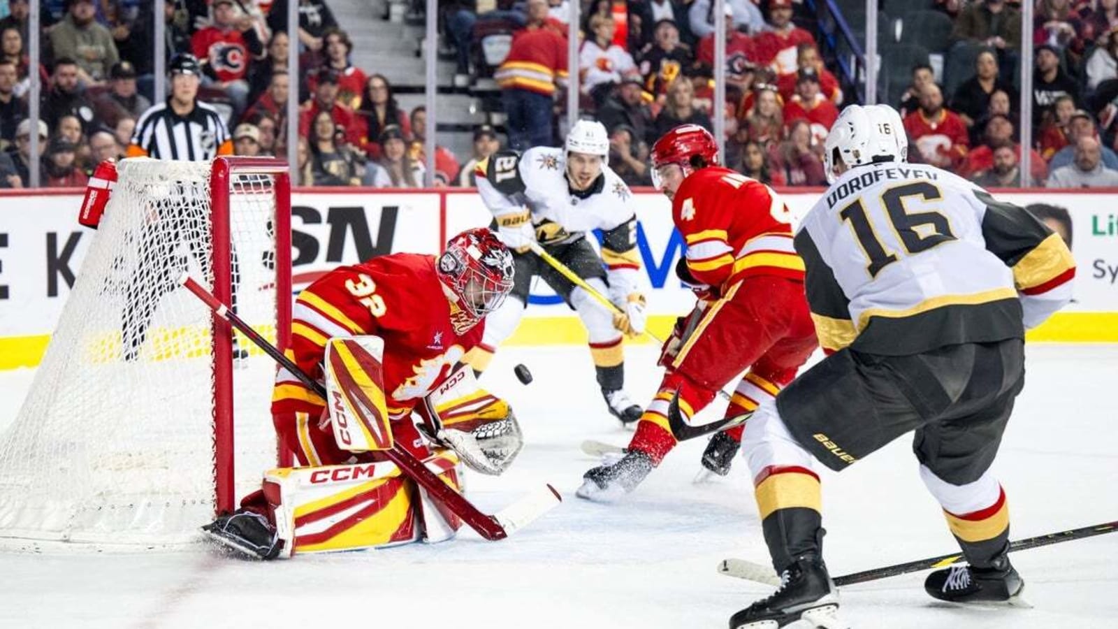 Knights top Flames in OT, clinch playoff spot