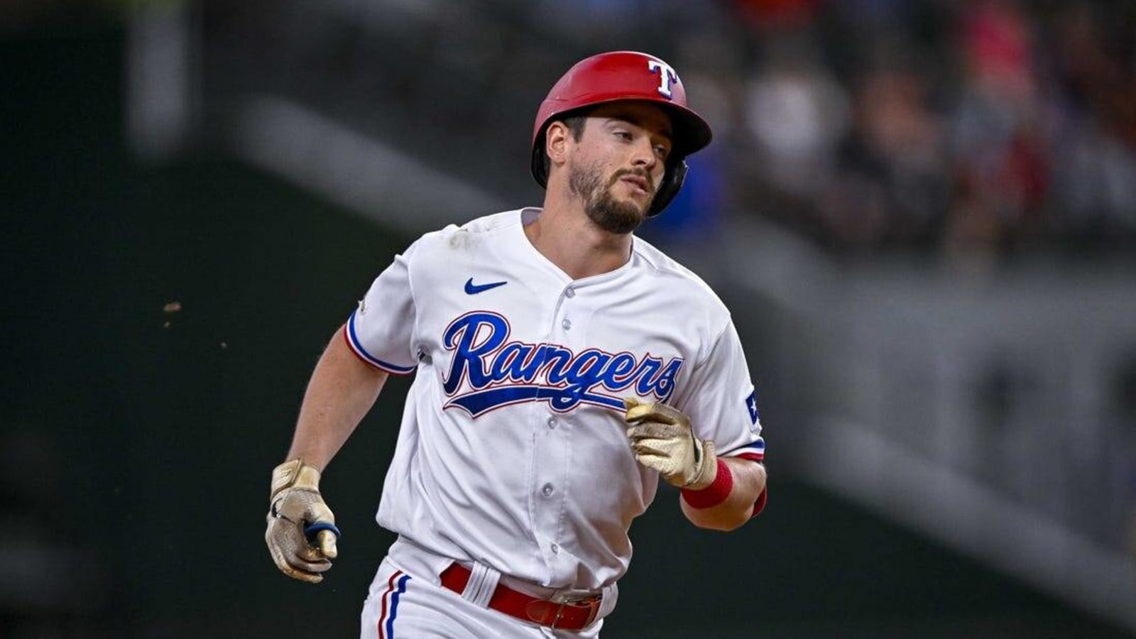 Rangers send OF Nick Solak to Reds