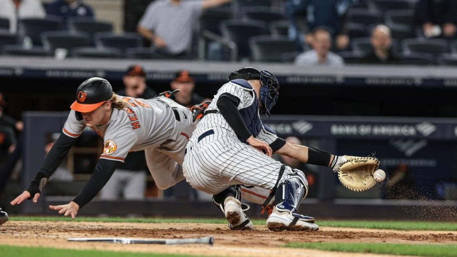 Orioles surge past Yankees behind eight-run inning
