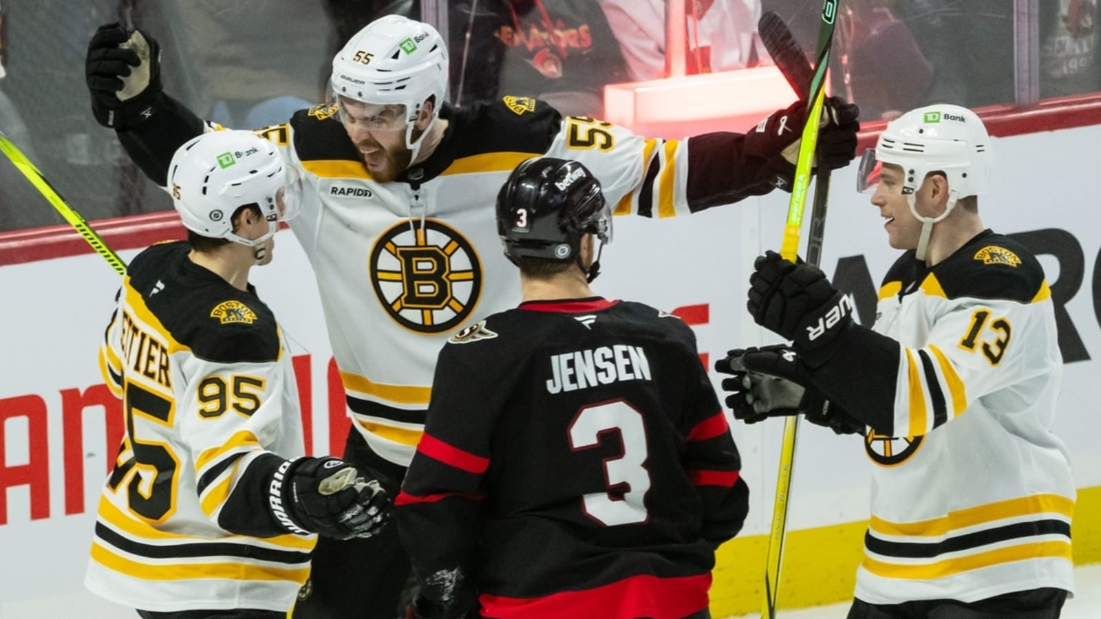 Bruins use big third period to double up Sharks
