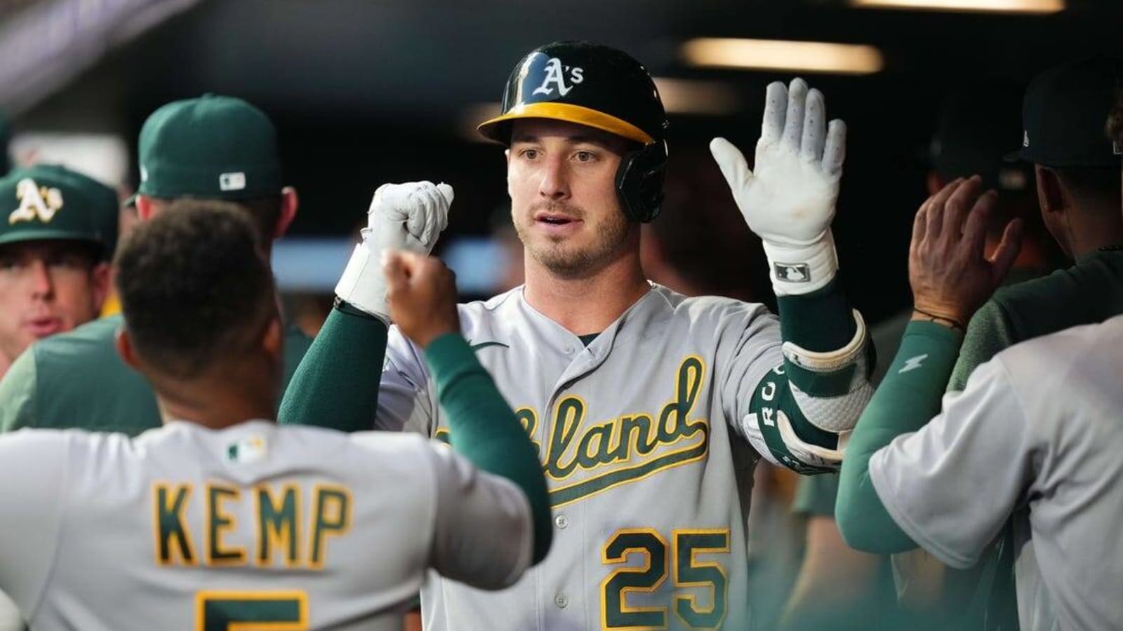 A&#39;s explode for 11 runs in walloping Rockies