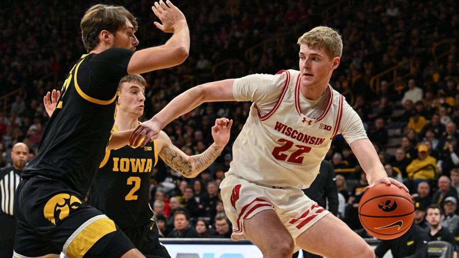 Iowa outlasts No. 20 Wisconsin in OT, 88-86