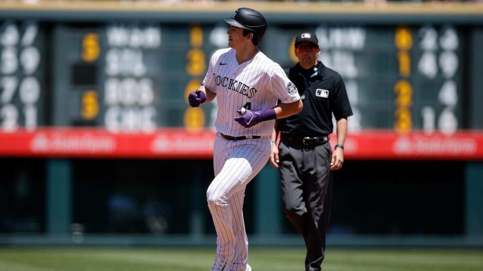 Alan Trejo&#39;s 11th-inning homer lifts Rockies past Yanks