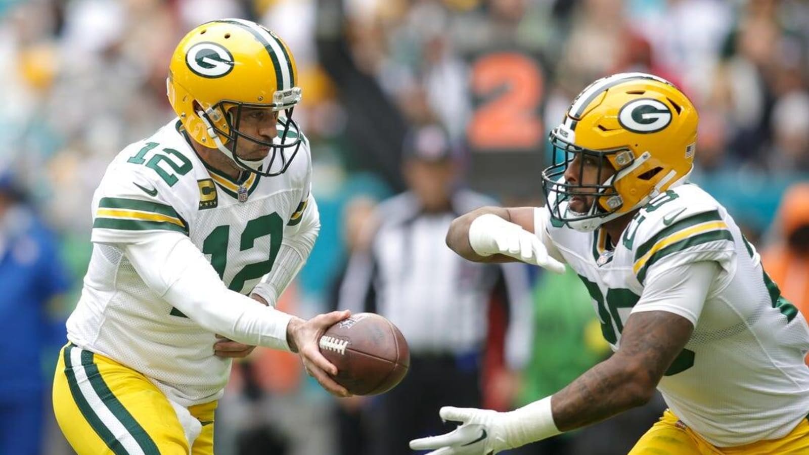 Late interceptions help Packers beat Dolphins