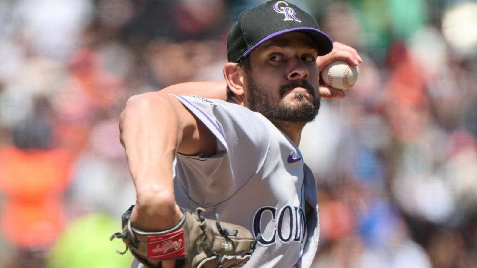 Braves acquire reliever Brad Hand from Rockies