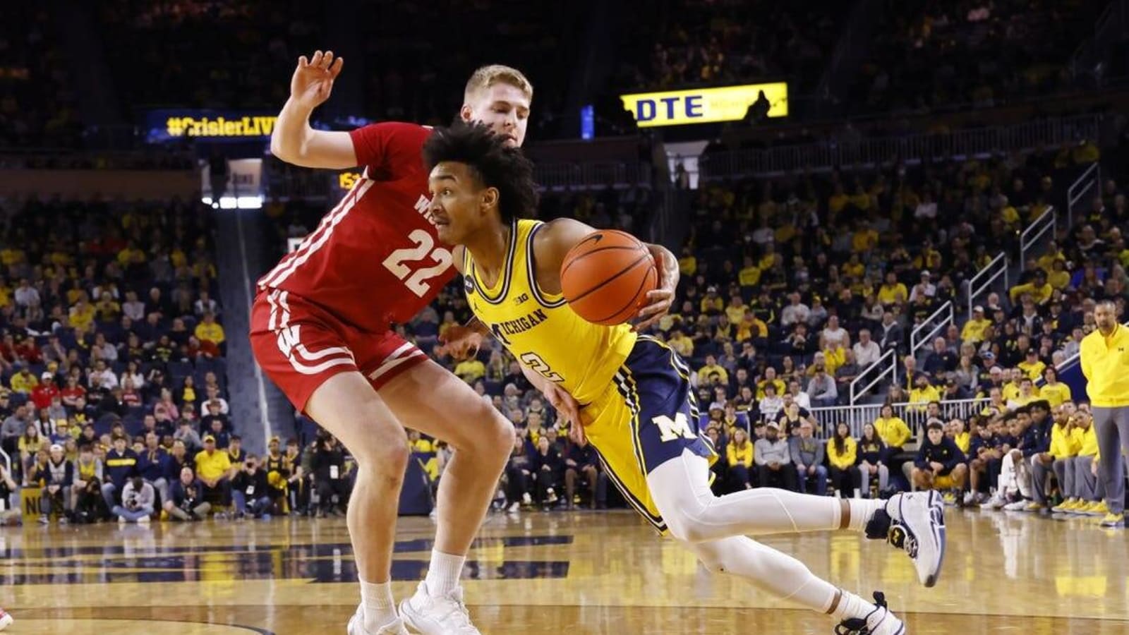 Michigan pulls away from Wisconsin in overtime