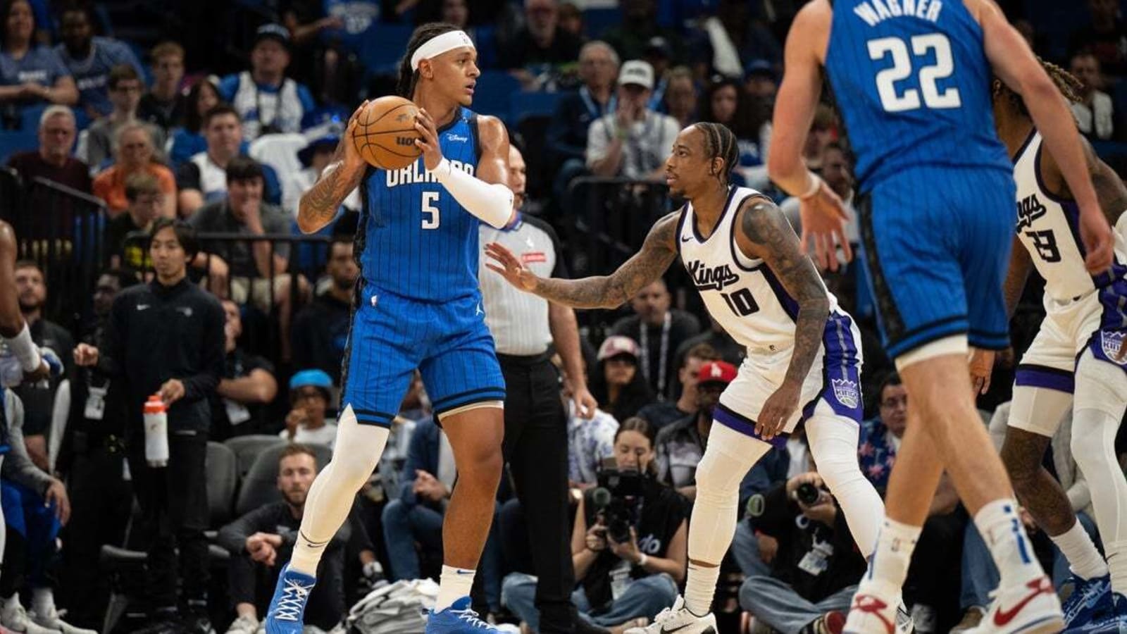 Hot shooting, stifling defense carry Magic over Kings